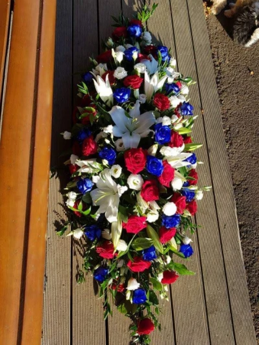 Red, white and blue coffin spray